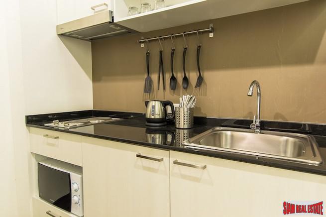 The Title | Top Floor Two Bedroom Condo for Sale Across from Rawai Beachfront-7