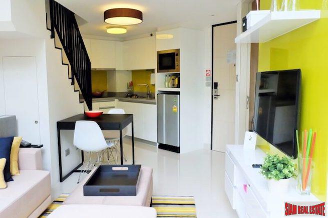 Cassia Residence | Bright Two Storey One Bedroom Condo for Sale in Laguna with Lagoon Views-0