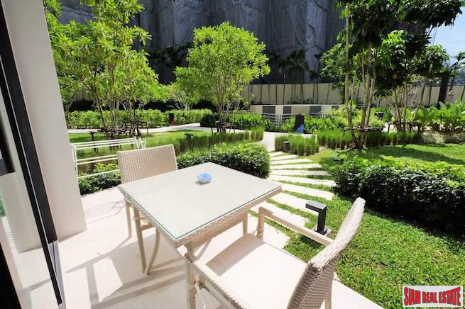 Cassia Residence | Pleasant Garden & Pool Views from this Two Storey One Bedroom Laguna Condo-0