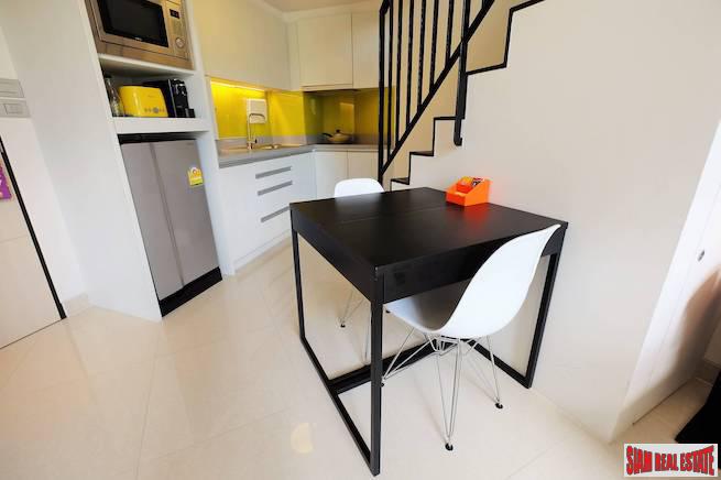 Cassia Residence | Pleasant Garden & Pool Views from this Two Storey One Bedroom Laguna Condo-3