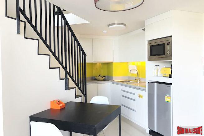 Cassia Residence | One Bedroom Two Storey Sea & Lake View Laguna Condo for Sale-2