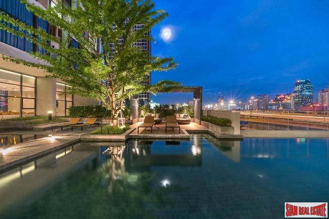 Chewathai Residence Asoke | Brightly Decorated City View Condo with Loft-style Bedroom near MRT Rama 9-0