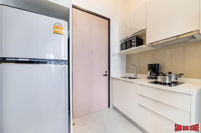 Chewathai Residence Asoke | Brightly Decorated City View Condo with Loft-style Bedroom near MRT Rama 9-14