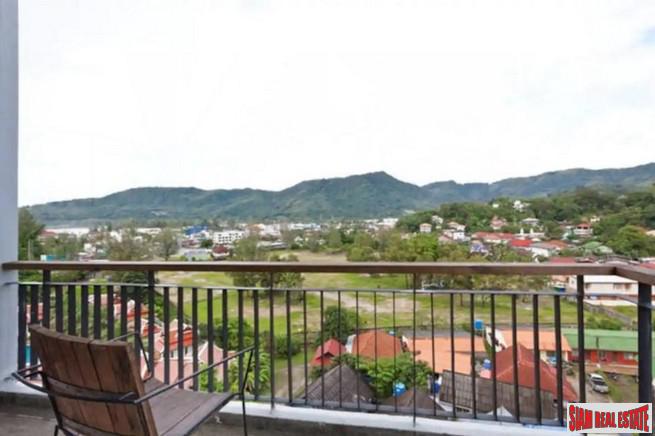 Icon Park Condominium | Two Bedroom Kamala Duplex with Large Open Windows and Green Views-12